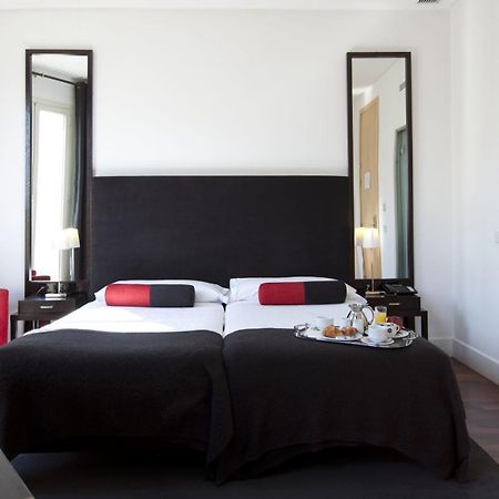 Quatro Puerta Del Sol Hotel Madri Quarto foto